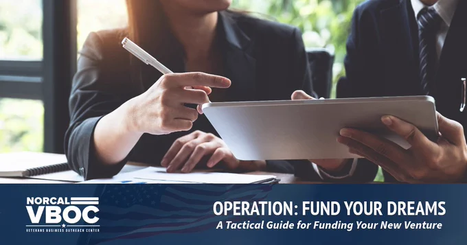 A couple of people reviewing a tactical guide to funding their new business venture.