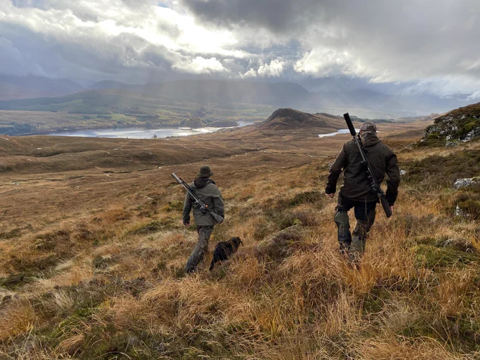 Two deer stalkers on the hillside at Creag Meagaidh National Nature Reserve. Picture copyright NatureScot