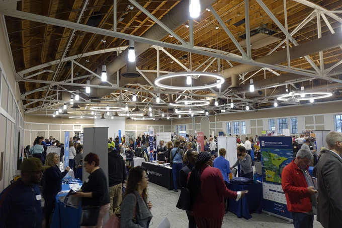 A large group of small business owners meet with government agencies and contractors during the 2023 SADBOC procurement fair.