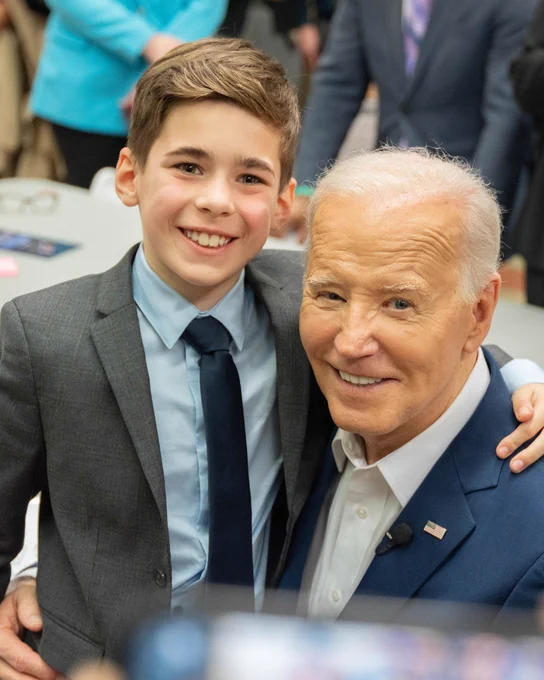 Harry Abramson (age 9) takes a photo with president Joe Biden.