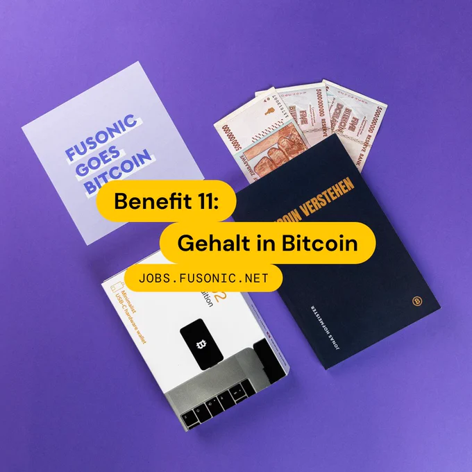 ein Buch und Geld auf einem lila Hintergrund