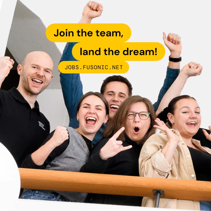eine Gruppe von Menschen posieren für ein Foto