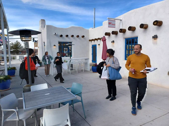 Participants of the U.S. Department of State's International Visitor Leadership Program visit El Vado in Albuquerque, New Mexico. Photo Credit: Downtown Albuquerque News.