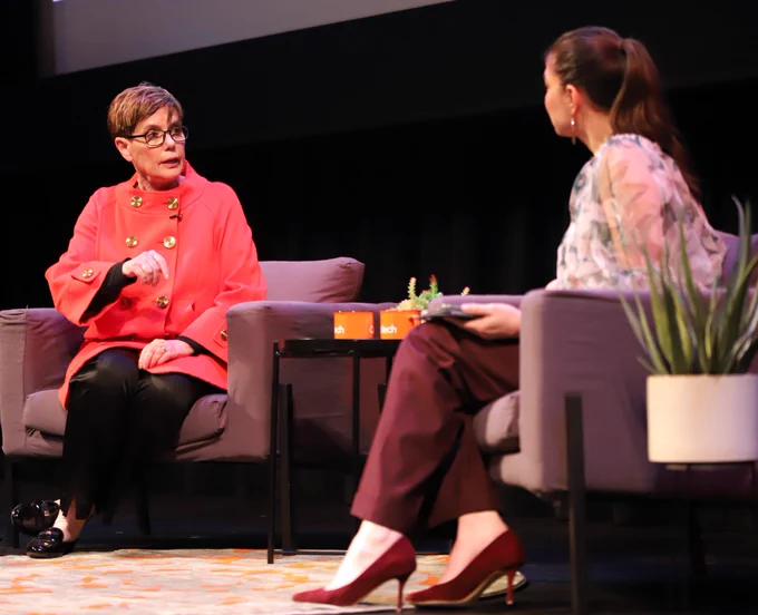 Diana Kormos-Buchwald sits and speaks with Crystal Dilworth on stage at Beckman Auditorium