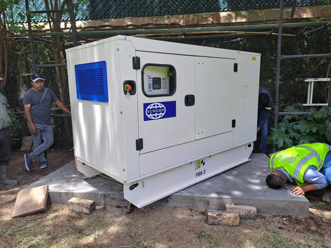Newly installed FG Wilson Sound Attenuated P88-3 diesel generator outdoors.