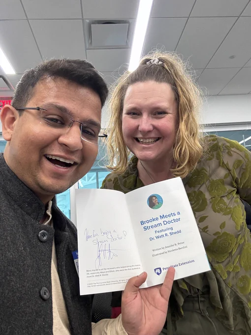 Praharsh and Jenn showing the Brooke Meets a Steam Doctor booklet signed to praharsh a current stream doctor. 