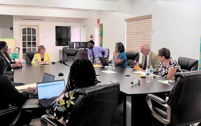 The delegation sat around a large conference table alongside officials from Montserrat
