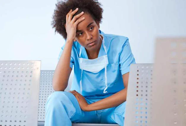 Tired female healthcare worker