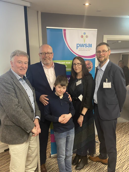 Our CEO John Dolan is pictured with Rory Tierney, Emma Walsh Tierney and their son Henry Tierney and Gary Brennan of @PWSAI at yesterday’s launch by @rodericogorman of a significant Joint National Report by PWSAI and @HSELive in Dublin. Group are standing in a row at a PWSAI banner.
