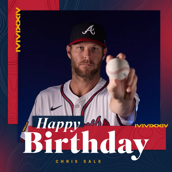 Chris Sale holds out a baseball toward the camera against a navy background.