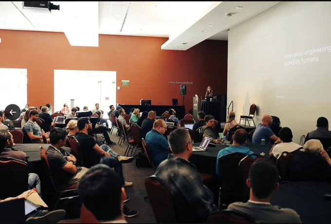 Rachel Tobac giving a talk at Node Summit in 2018 discussing the ways attackers could social engineer open source security maintainers to gain the ability to introduce vulnerabilities and attack at scale.
