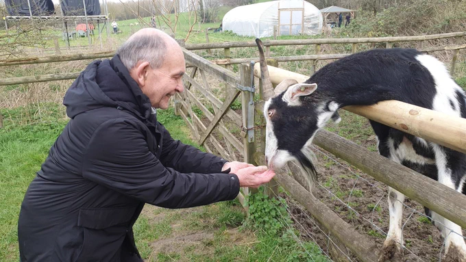 Home Instead Client enjoying a visit to Standalone Farm