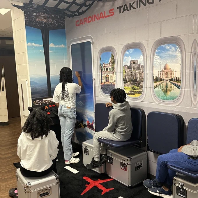 students collaborating in the pod