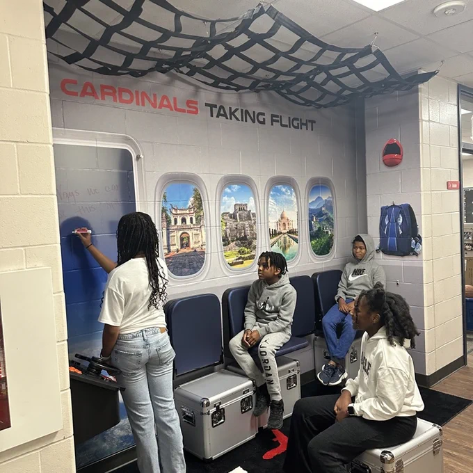 students collaborating in the pod