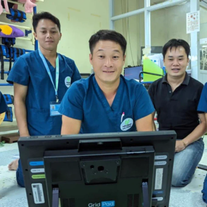 Staff at the Lao Friends Hospital for Children with a Grid Pad 12.