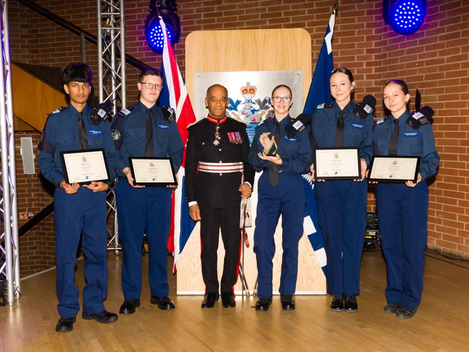 Cadets of the year stand with Sir Kenneth Olisa 