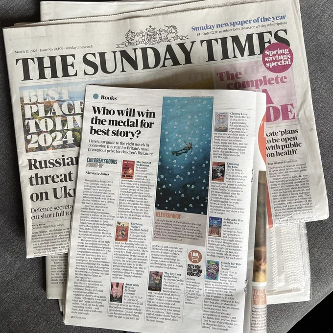 Copy of the Sunday Times with a page open in the Books section with the headline 'Who will win the medal for best story?'. The article is about the Yoto Carnegies 2024 shortlist, which is linked in full in the post. 