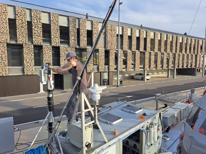 Dr Tom Jorden installing the equipment on the Tara