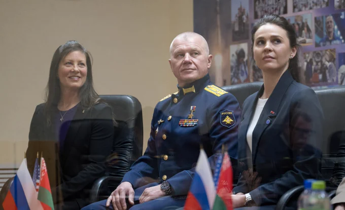 Expedition 71 NASA astronaut Tracy Dyson, left, Roscosmos cosmonaut Oleg Novitskiy, and Belarus spaceflight participant Marina Vasilevskaya, right, are seen during the State Commission meeting to approve the Soyuz launch of Expedition 71 to the International Space Station, Wednesday, March 20, 2024 at the Cosmonaut Hotel in Baikonur, Kazakhstan. 