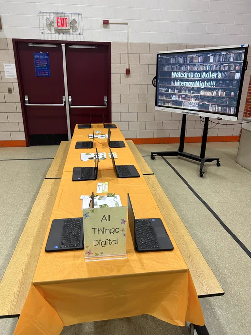 Chromebooks on a lunch table set up for an event