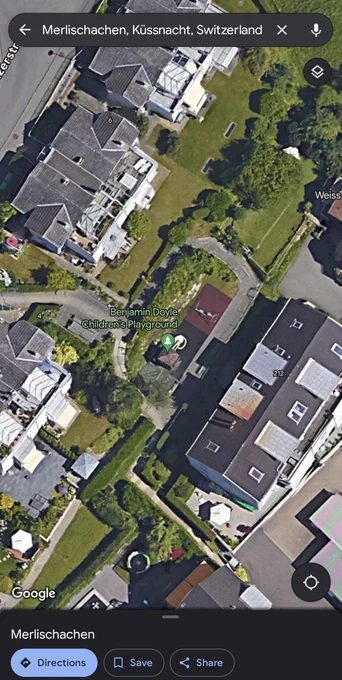 A Google maps Satellite view of Merlischachen Switzerland, showing "Benjamin Doyle Children's Playground"