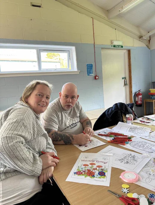 Two residents doing Easter crafts.