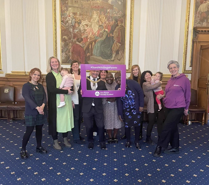 The Lord Provost Robert Aldridge alongside guests from One Parent Families Scotland and the single parent community.  