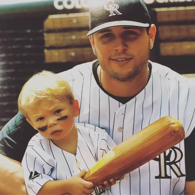 A young Jackson poses with his dad, Matt, a seven-time All-Star.