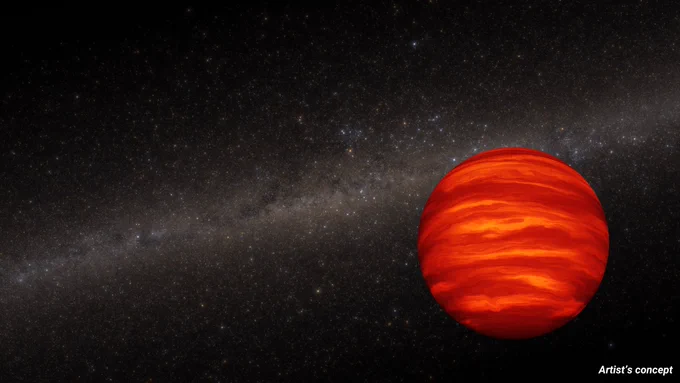 This artist's concept shows a brown dwarf, an object more massive than a planet but smaller than a star. The dwarf is a cherry-red sphere. It has horizontal stripes of various shades of red that are cloud bands. In the dark background there are myriad stars that are inside our Milky Way galaxy. White text reads "Artist's concept" in the lower right corner.