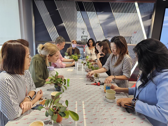 Oracle Wellness planting in the office