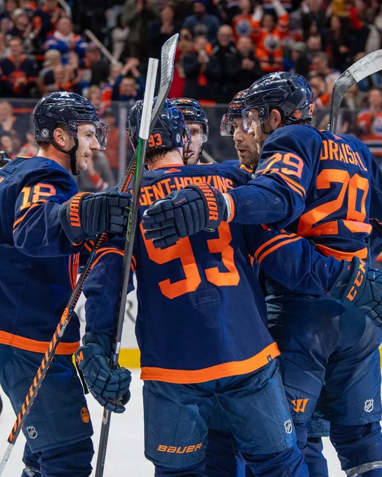 The Oilers celebrating a goal on the ice at Rogers Place. 