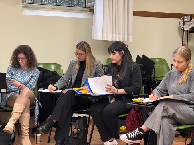 Partners taking notes during a presentation at the kick off meeting in Rome. 