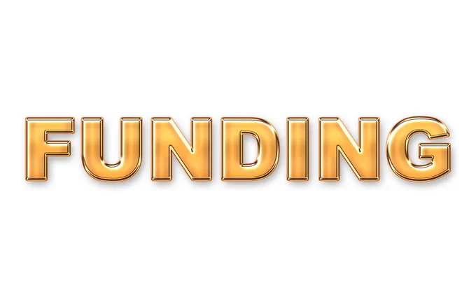 The word 'funding' written in gold, bold letters. Image by Pete Linforth from Pixabay