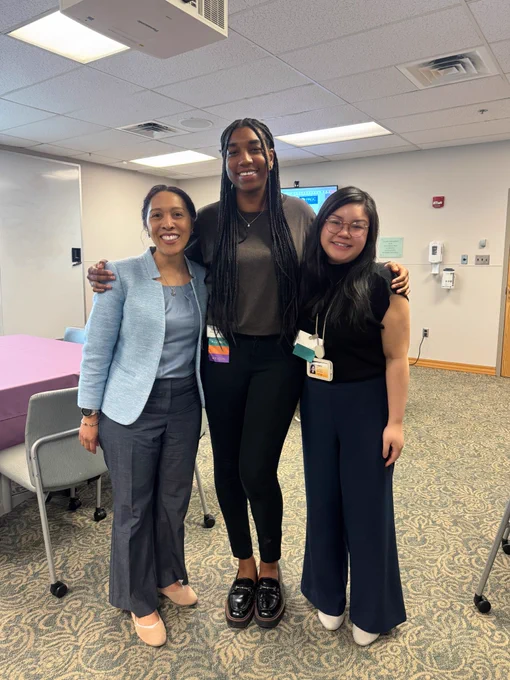 Yuriko, Shannon, and Leann standing together and smiling at the PAGC conference