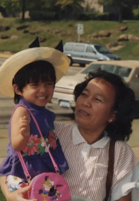 Hien as a child with her mother.