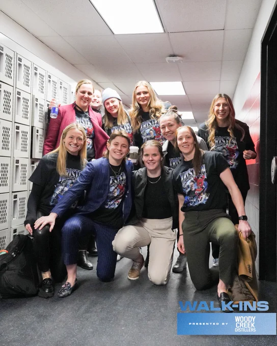 Lauriane Rougeau, Maude Poulin-Labelle, Allie Munroe, Olivia Knowles, Jocelyne Larocque, Kali Flanagan, Renata Fast, Carly Jackson and Erica Howe wearing custom Kristen Campbell shirts, posing with Kristen Campbell.