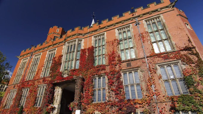 Firth Court with red ivy running up and down the building.