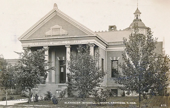 Black and white postcard of a public library.