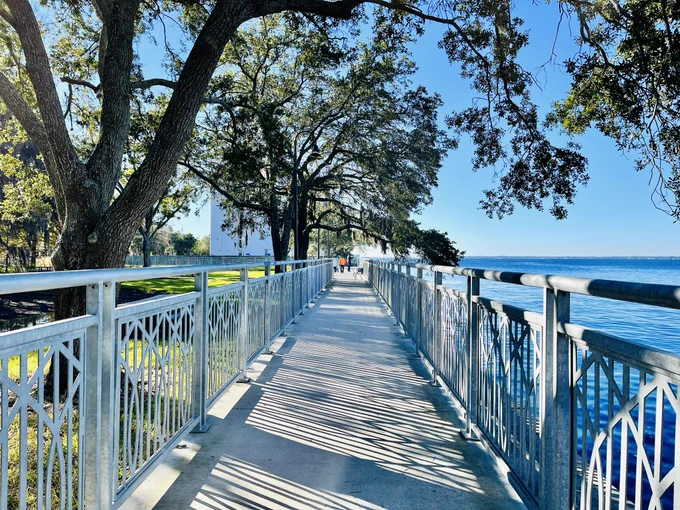 The San Marco side of the shared use path with trees overhanging