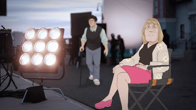 A woman with Cherubism sitting at work on a TV set, a man is using a walking stick behind her