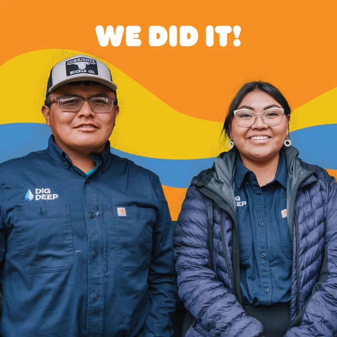 Photo of a man and woman against a wavy orange, yellow, and blue background. Text: We did it!