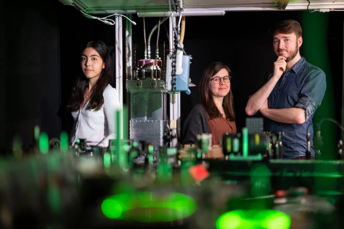 Negar Baradaran, Marissa Weighman, and Dominik Charczun in a lab