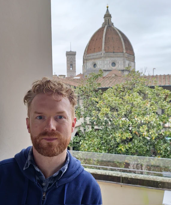 Portrait stood in front of the dome
