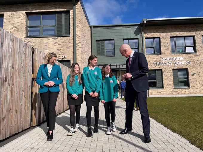 Cabinet Secretary for Education and Skills Jenny Gilruth MSP and John Swinney MSP meet pupils from Riverside Primary School.