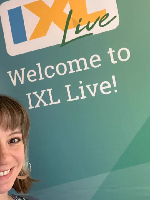 Cropped photo of my face in front of the IXL Live banner. 
