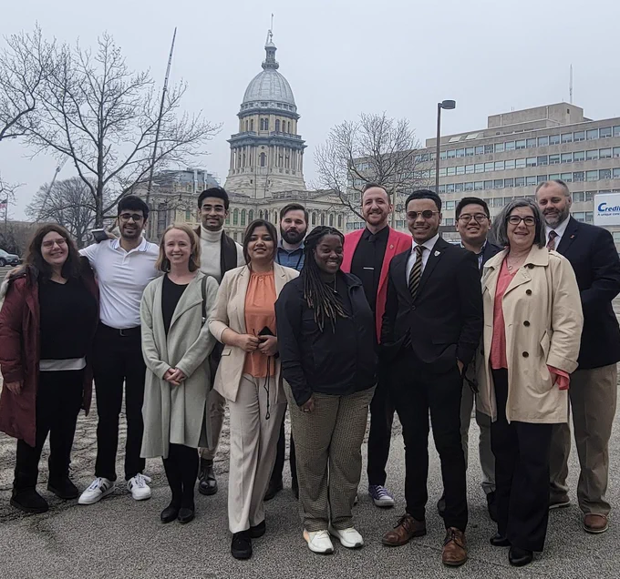 Image of Illinois Science Policy Program Scholars and Policy & Research Legislative Fellows standing in front of the Illinois Capitol Building, pictured from left to right:

Dora Kourkoulou, Kushal Vinod, Elsa Augustine, Shuvam Das, Ayushi Dubey, Alex Sprinkle, Angelique Evans, Benjamin Campbell, Drake Materre, Kaung Nyein, Evangeline Pianfetti and Carl Baker 
