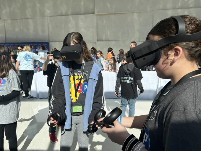 Two students doing VR