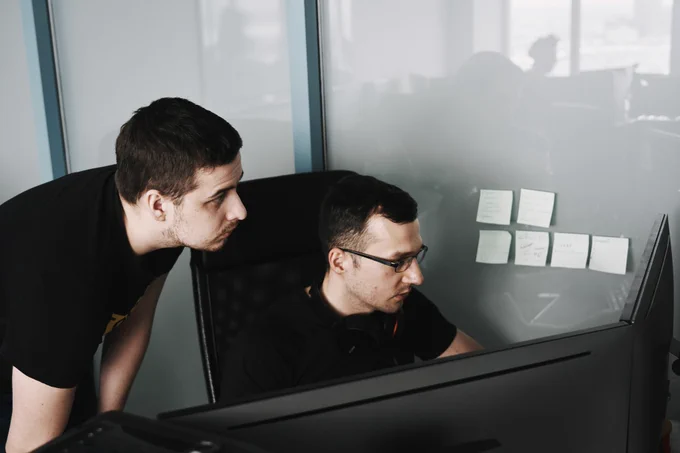 Two men in black shirts looking at computer screens in an office setting.

Photo by Maxim Tolchinskiy on Unsplash

https://unsplash.com/photos/man-in-black-tank-top-wearing-eyeglasses-Mza_iyInfFE
