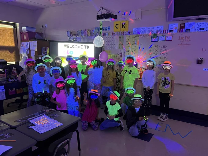 students glowing in the dark