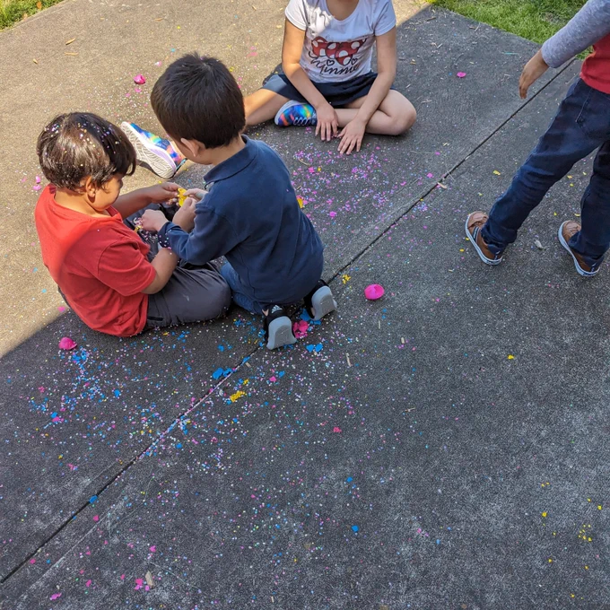 Kids playing with cascarone debris